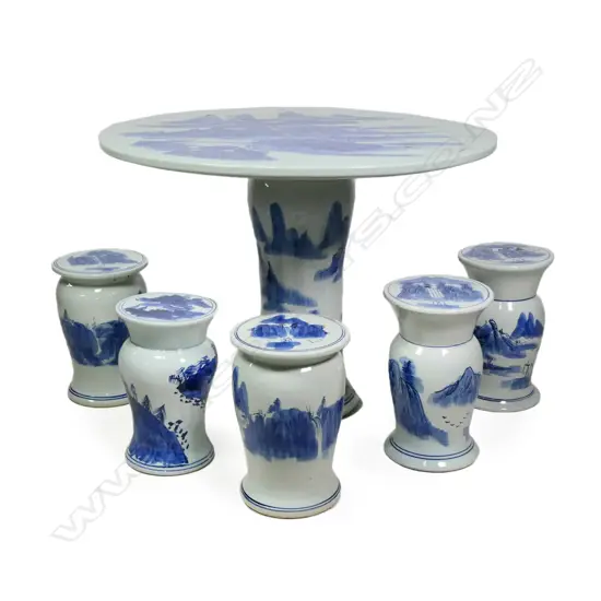 A late 20thC Chinese ceramic pedestal table and five stool set,