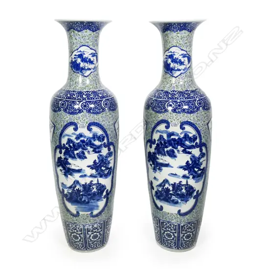 A pair of large and impressive 20thC Chinese floor standing vases,