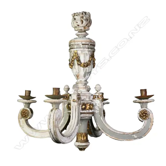 An antique wooden French candle chandelier,