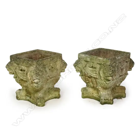 A pair of vintage concrete garden urns,