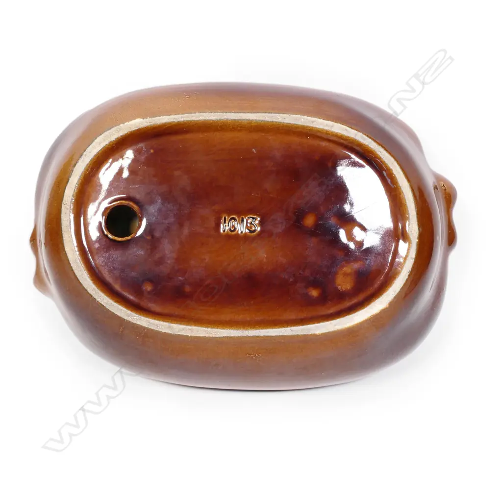 A Crown Lynn Wharetana Māori Art Pottery 'Koruru' small dish, Image 1++