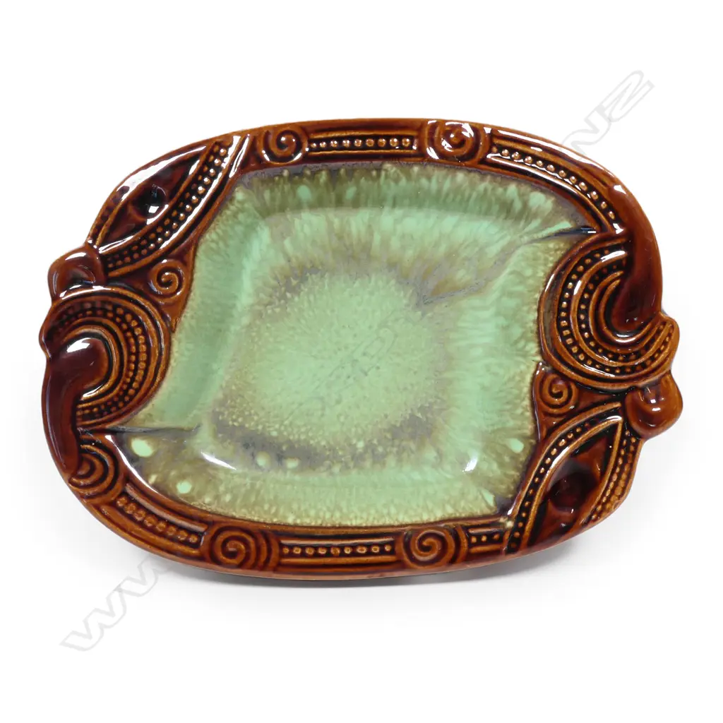 A Crown Lynn Wharetana Māori Art Pottery 'Koruru' small dish, Image 1++