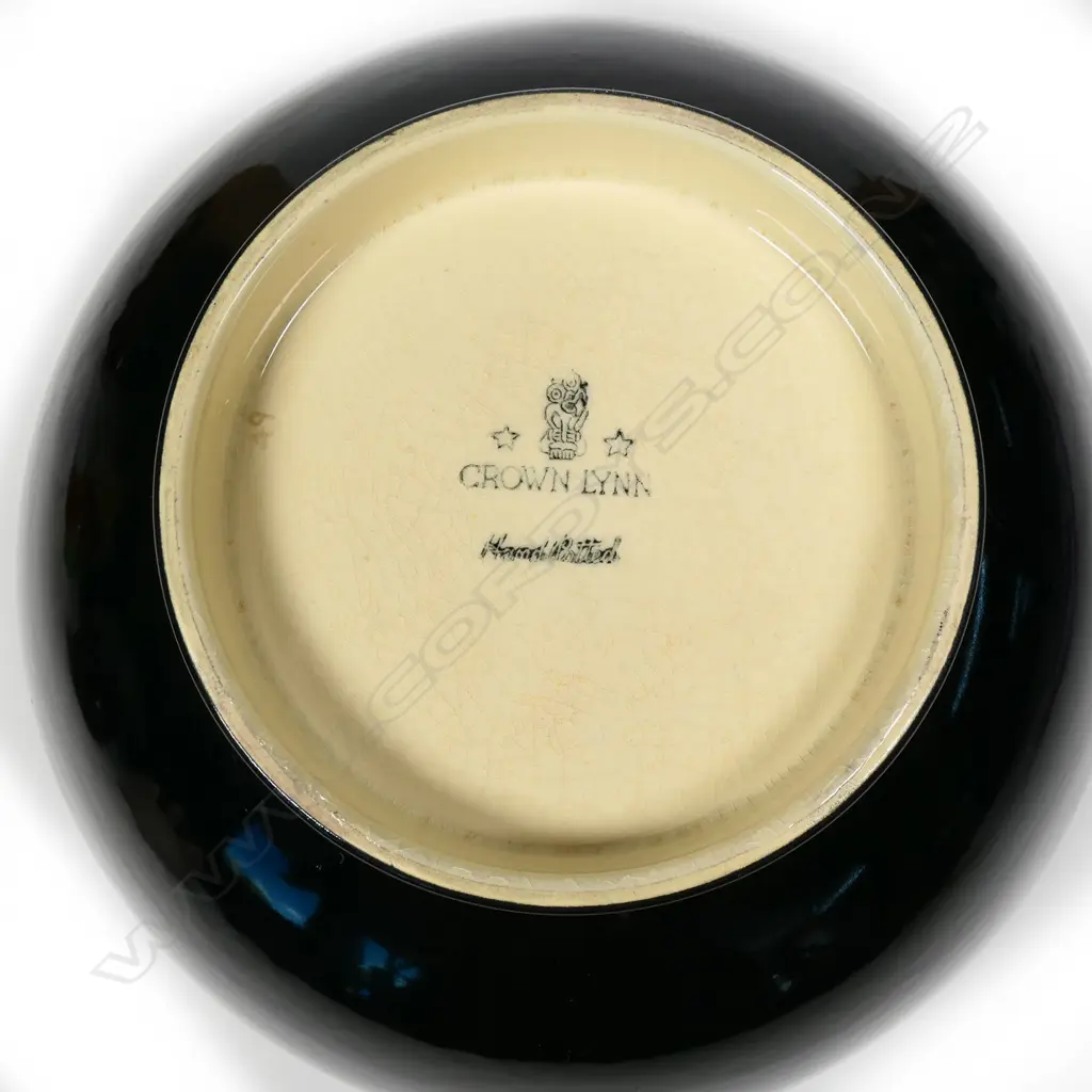 A rare Crown Lynn 'Hand Potted' large black and pale-yellow glazed bowl, Image 1++