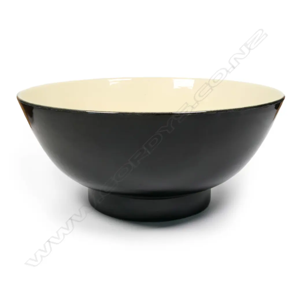 A rare Crown Lynn 'Hand Potted' large black and pale-yellow glazed bowl, Image 1++