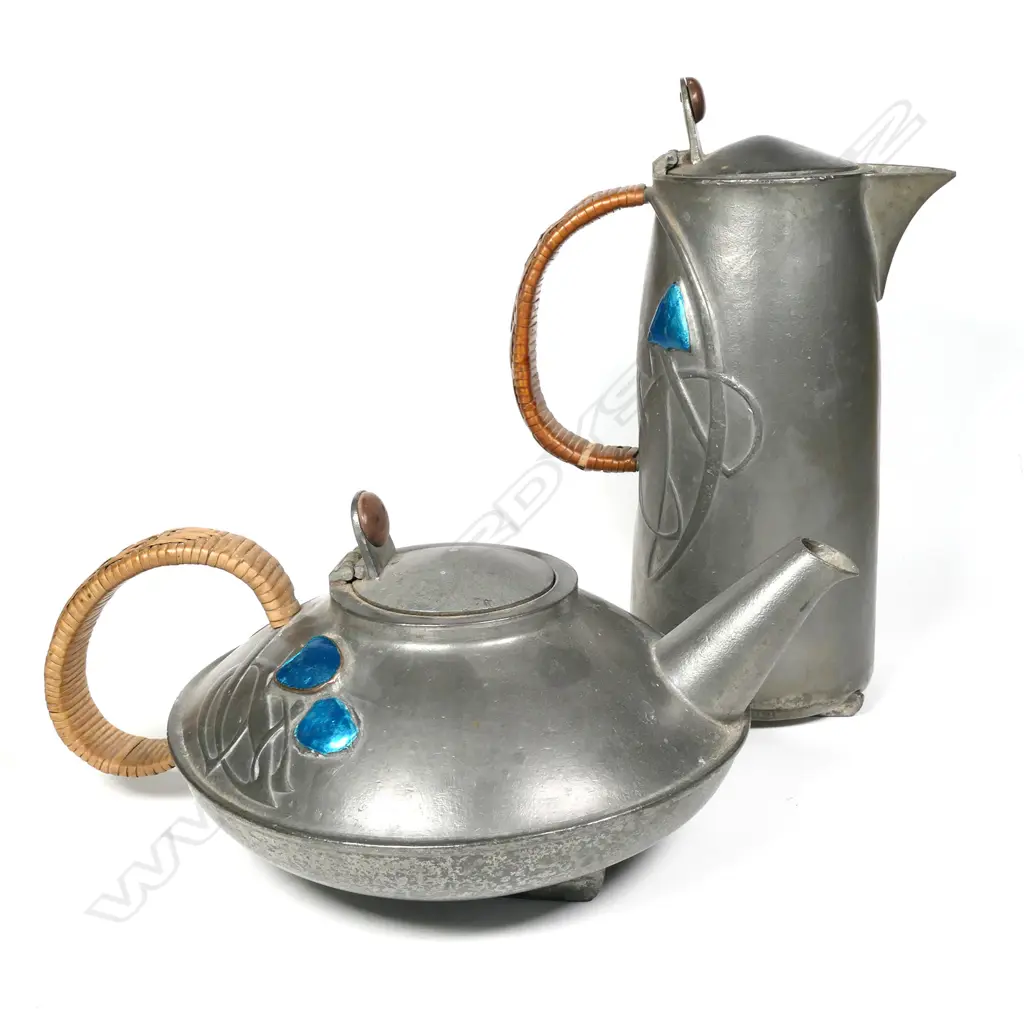 An Archibald Knox design Tudric pewter teapot and hot water pots, Image 1++