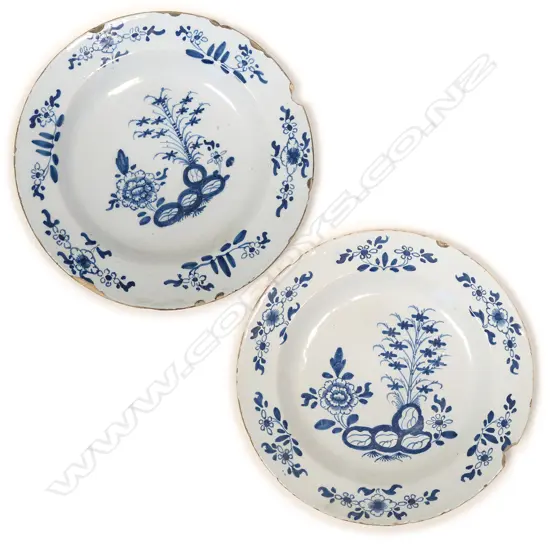 A pair of large Delft blue, tin glaze shallow bowls,