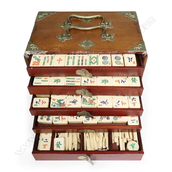 An early 20thC bone and bamboo mah jong set,