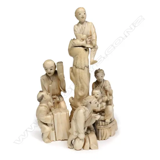 A Japanese ivory okimono figure group,