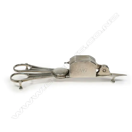 A George III silver candle snuffer