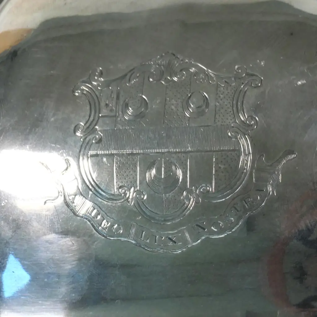 A William IV silver food dome with a cast handle modelled as the crest of the Holloway family, an antelope's head collared and chained at it's breast a crescent, Image 1++