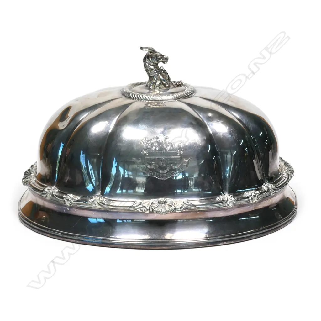 A William IV silver food dome with a cast handle modelled as the crest of the Holloway family, an antelope's head collared and chained at it's breast a crescent, Image 1++