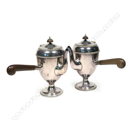 A pair of silver plate early 20thC hot chocolate pots,