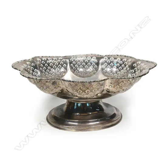 A large silver oval pedestal bowl,