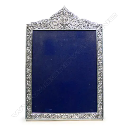 A large silver photo frame,