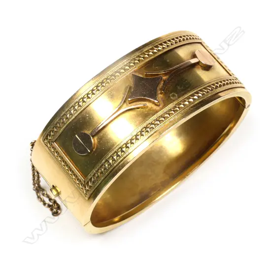 A Victorian 15ct gold hinged bangle,