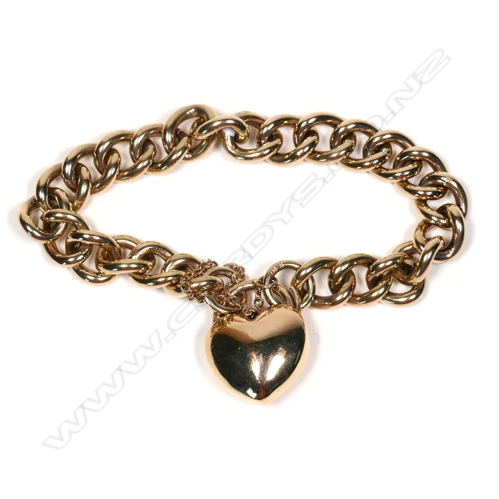 A 9ct gold curb link bracelet, Image 1++