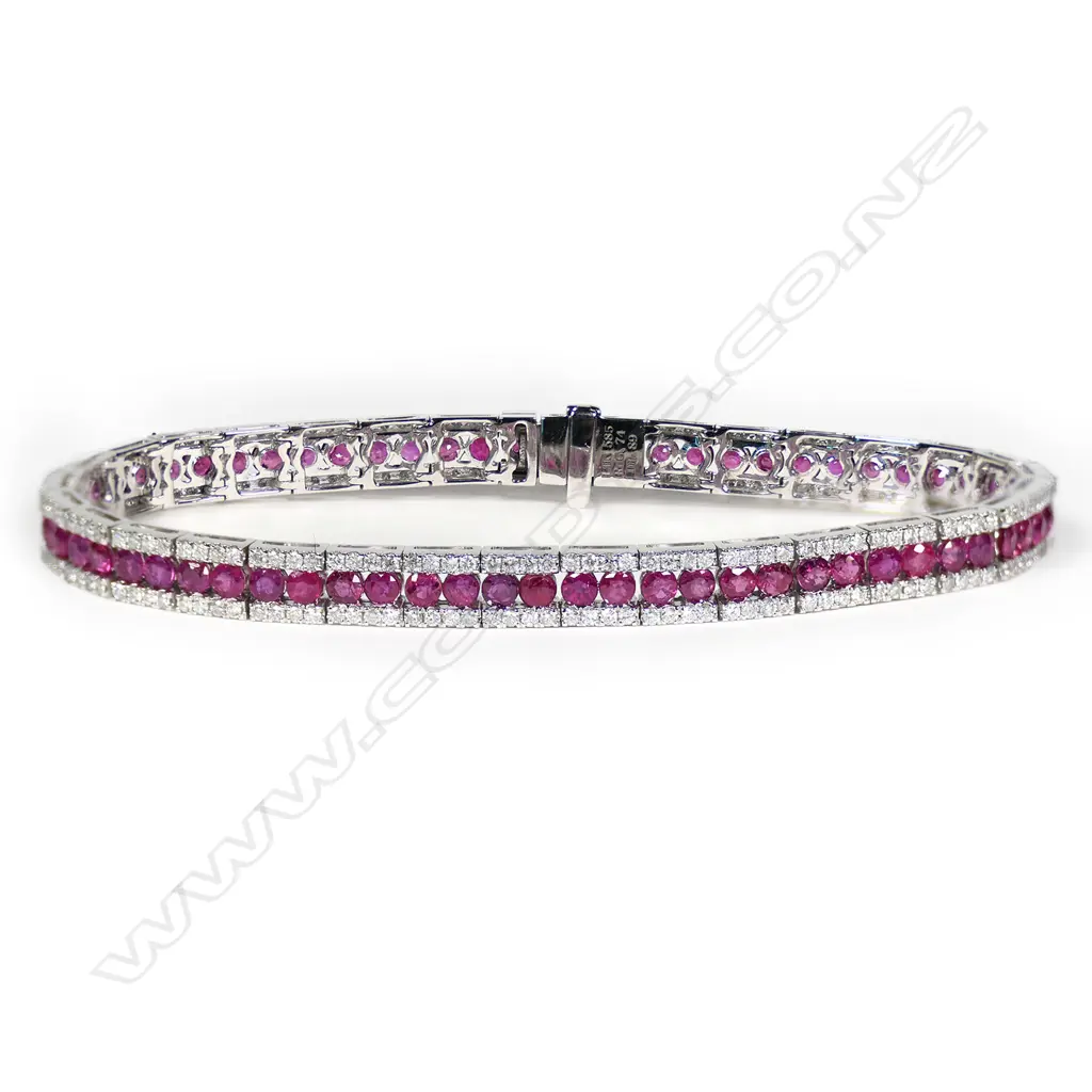 A 14ct white gold, ruby and diamond line bracelet, Image 1++
