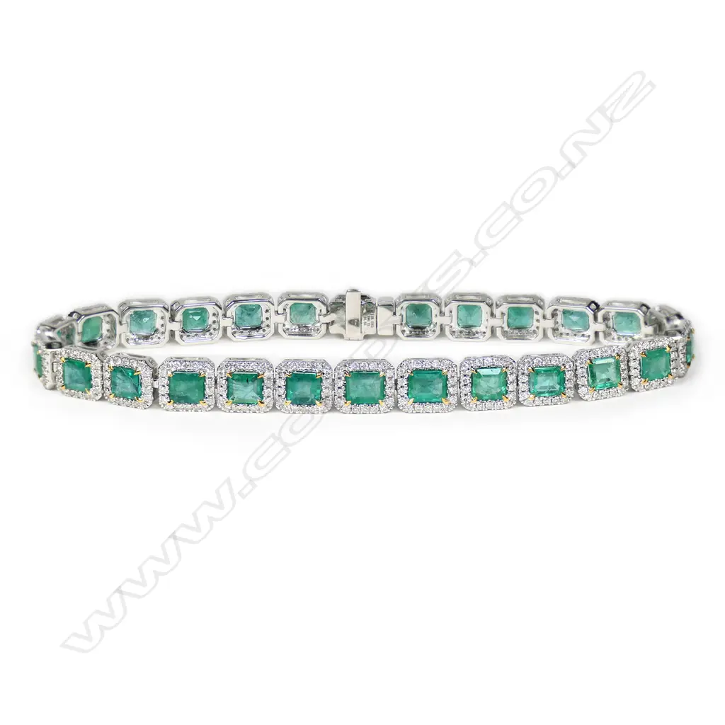 A 14ct white gold, emerald and diamond halo line bracelet, Image 1++