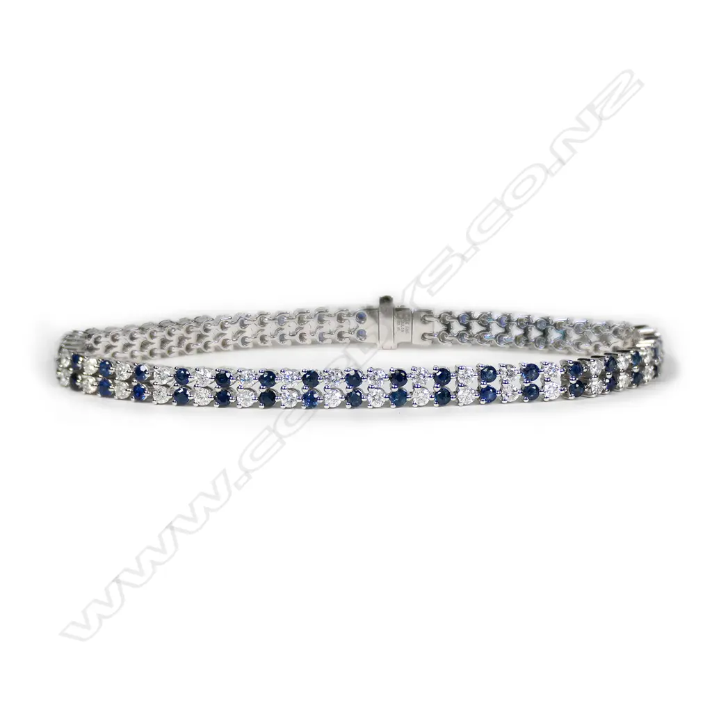 A 14ct white gold, sapphire and diamond tennis bracelet, Image 1++