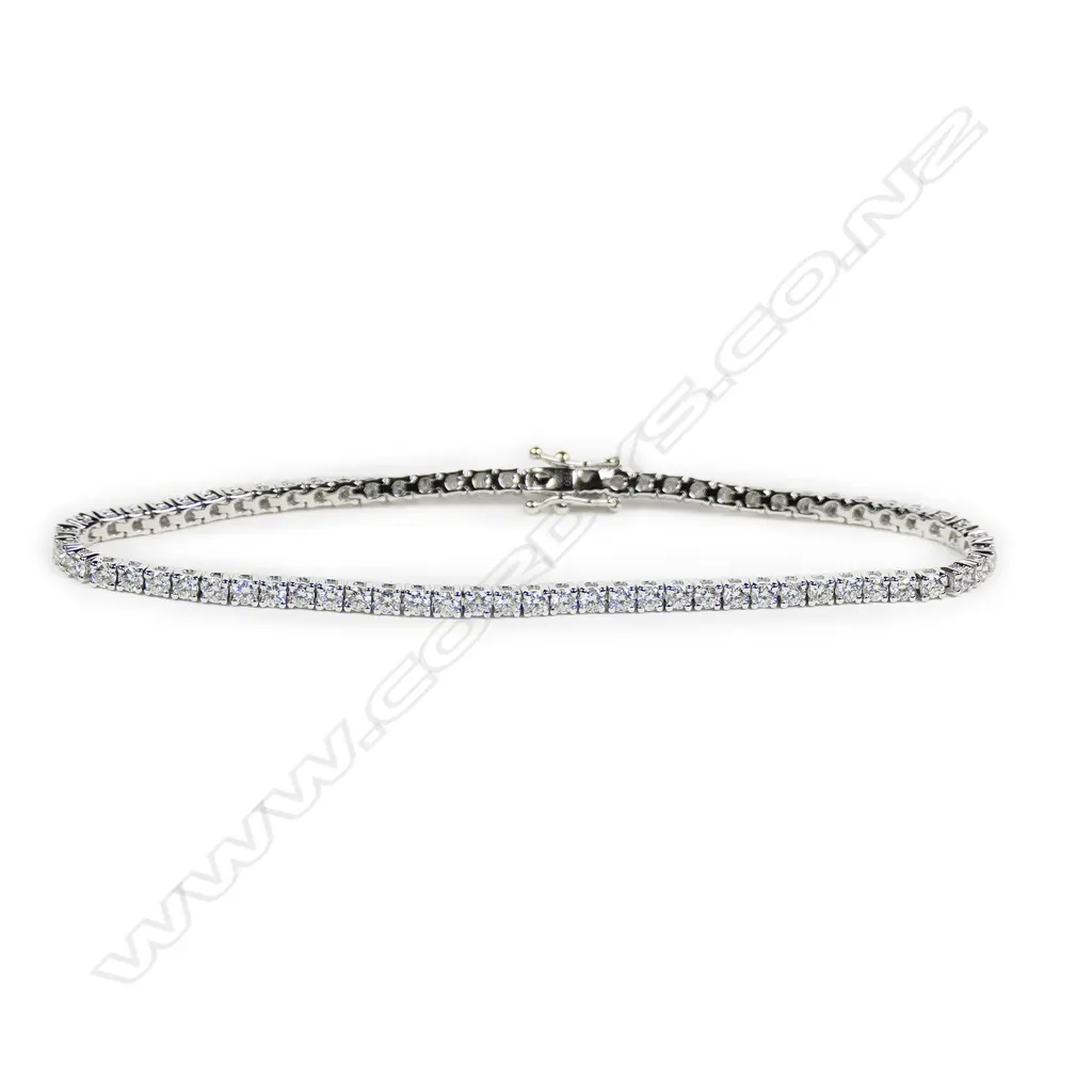 An 18ct white gold and diamond tennis bracelet, Image 1++