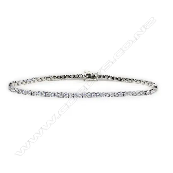 An 18ct white gold and diamond tennis bracelet,