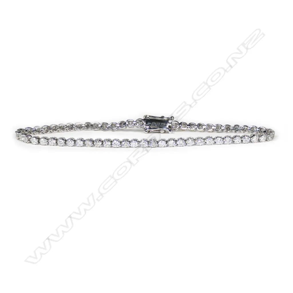 A 14ct white gold and diamond tennis bracelet, Image 1++