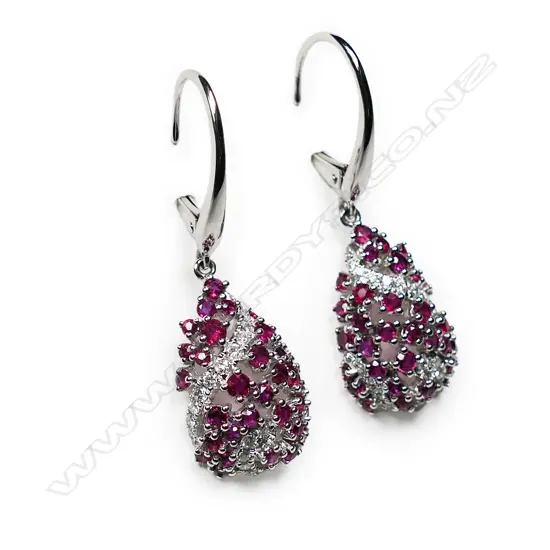 A pair of 14ct white gold, ruby and diamond cluster drop earrings,