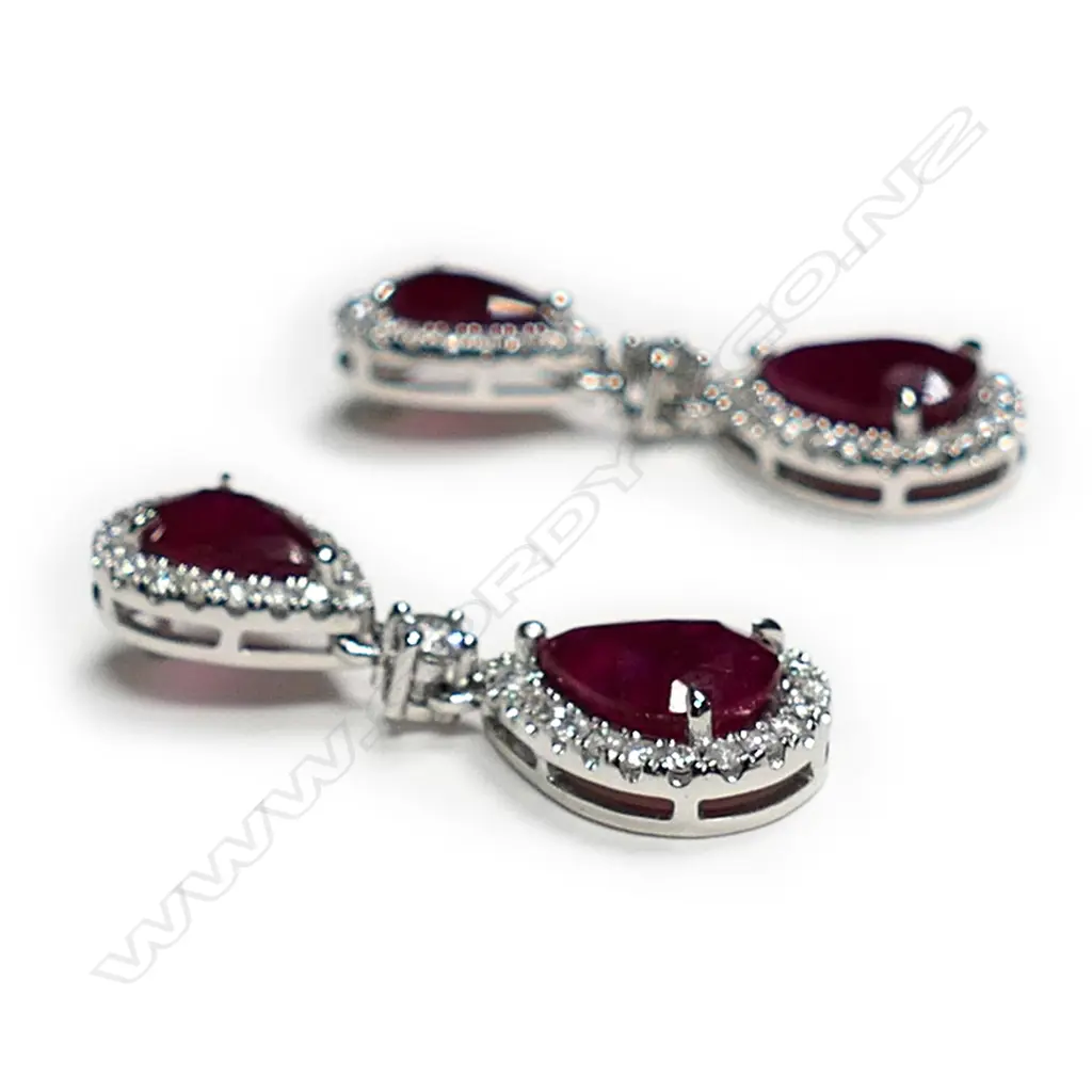 A pair of platinum, ruby and diamond drop earrings, Image 1++