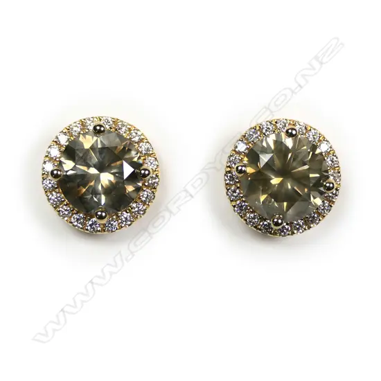 An 18ct white gold, champagne and white diamond earrings,