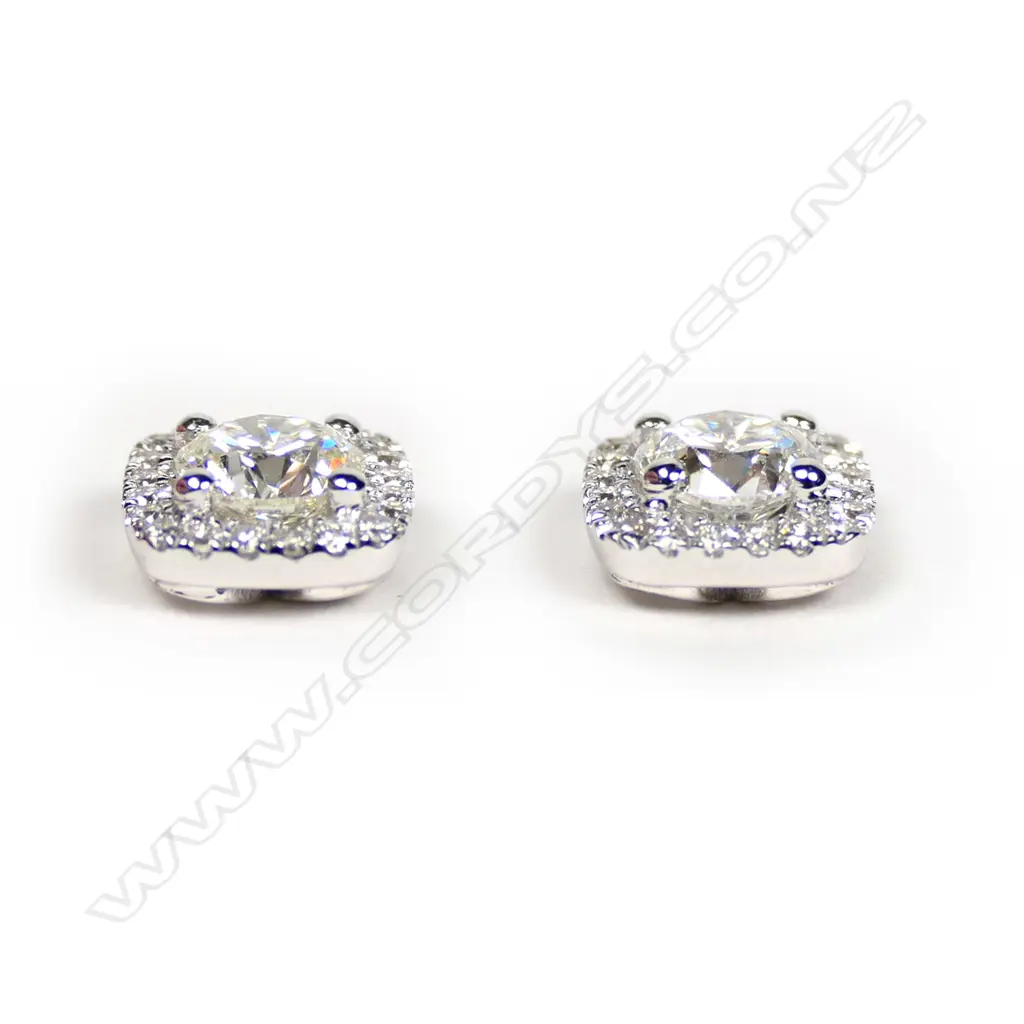 A pair of 18ct white gold and diamond square form earrings, Image 1++