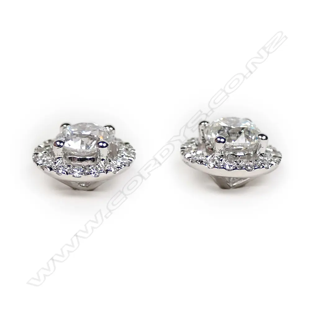 A pair of 18ct white gold and diamond round form earrings, Image 1++
