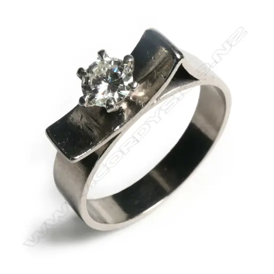 A retro palladium set, diamond solitaire ring,