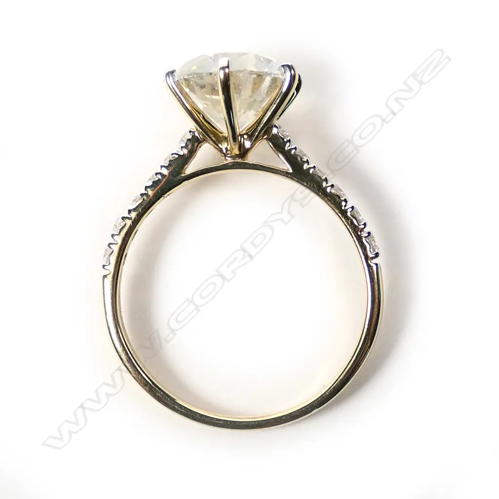 A 14ct gold and diamond solitaire ring, Image 1++