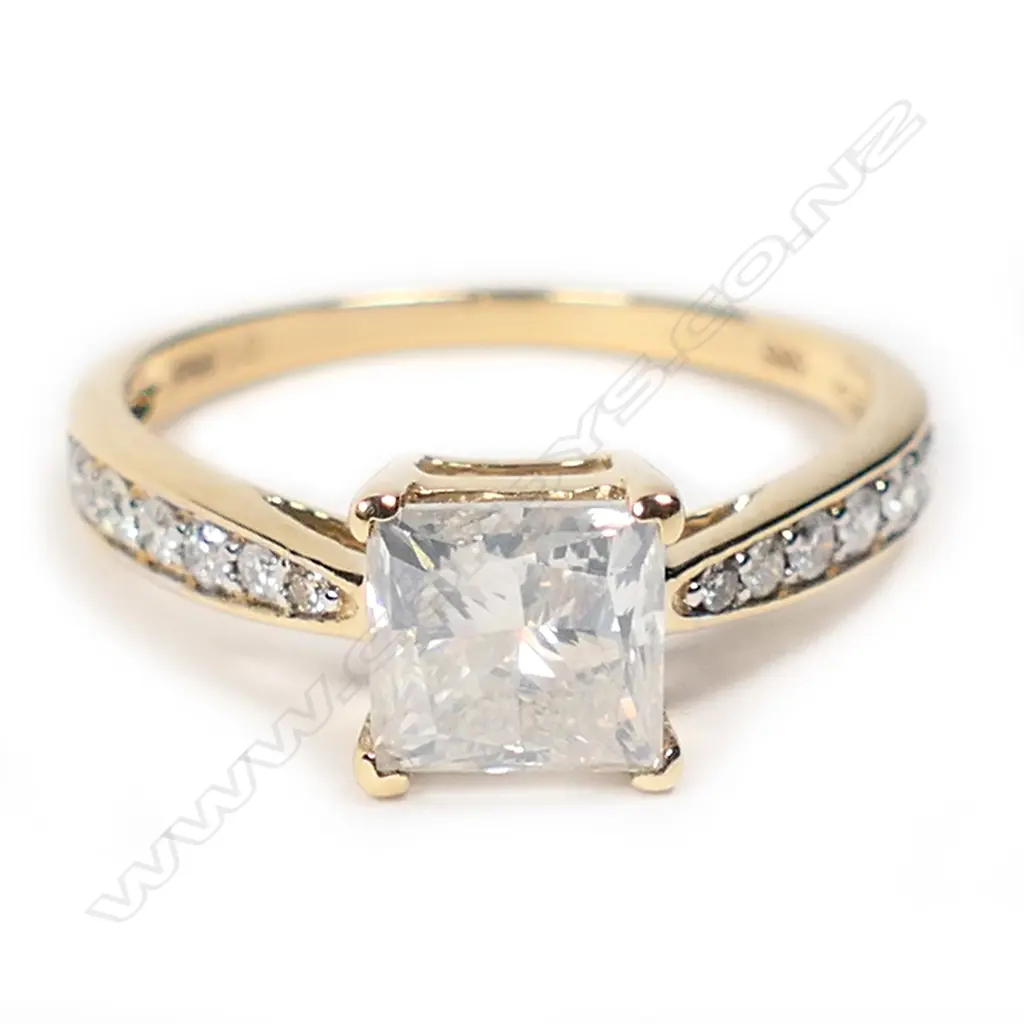A 14ct gold and diamond solitaire ring, Image 1++