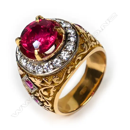 An impressive 18ct gold ruby and diamond ring,