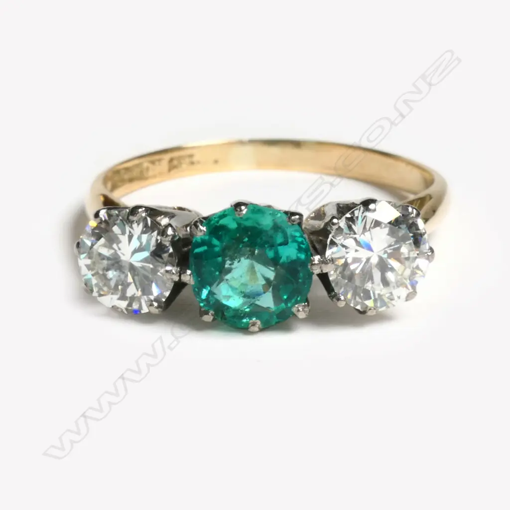 An estate 18ct gold emerald and diamond ring, Image 1++