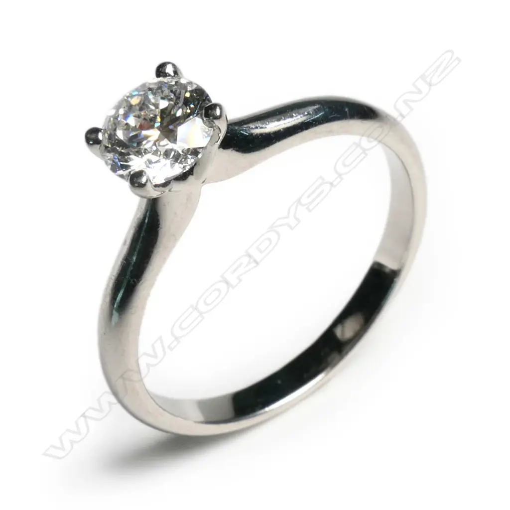 A 14ct white gold and diamond solitaire ring, Image 1++