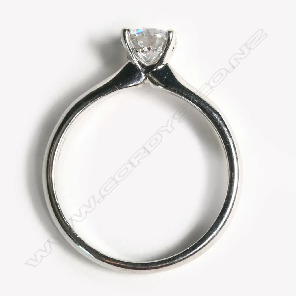A 14ct white gold and diamond solitaire ring, Image 1++