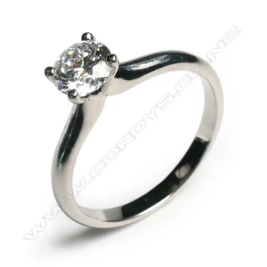 A 14ct white gold and diamond solitaire ring,