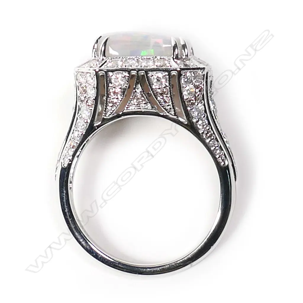 A 14ct white gold opal and diamond cocktail ring, Image 1++