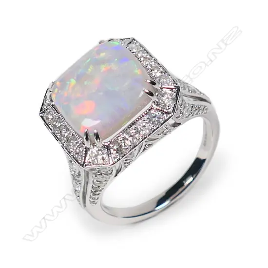 A 14ct white gold opal and diamond cocktail ring,