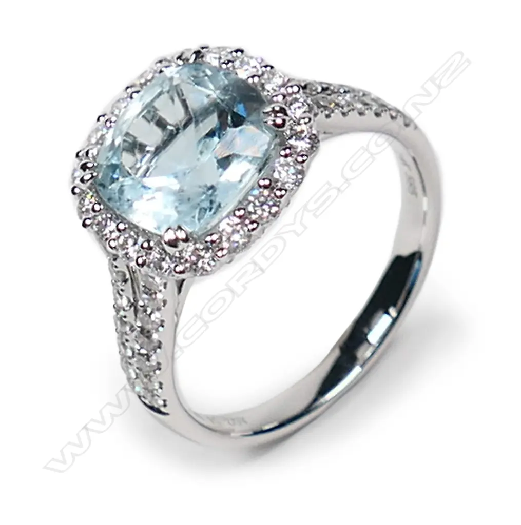 A 14ct white gold aquamarine and diamond vintage style halo ring, Image 1++