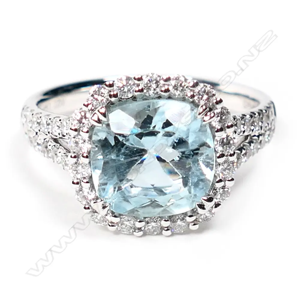 A 14ct white gold aquamarine and diamond vintage style halo ring, Image 1++