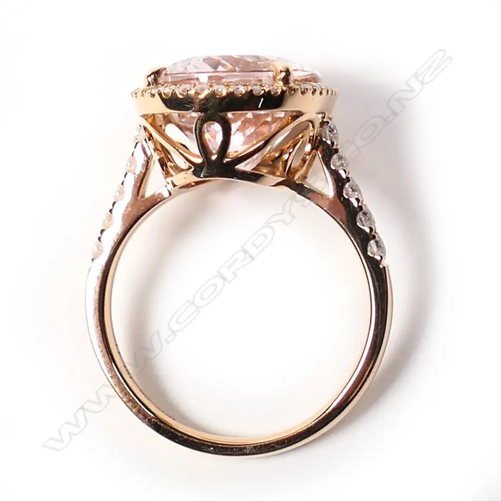 An 18ct rose gold, morganite and diamond halo ring, Image 1++