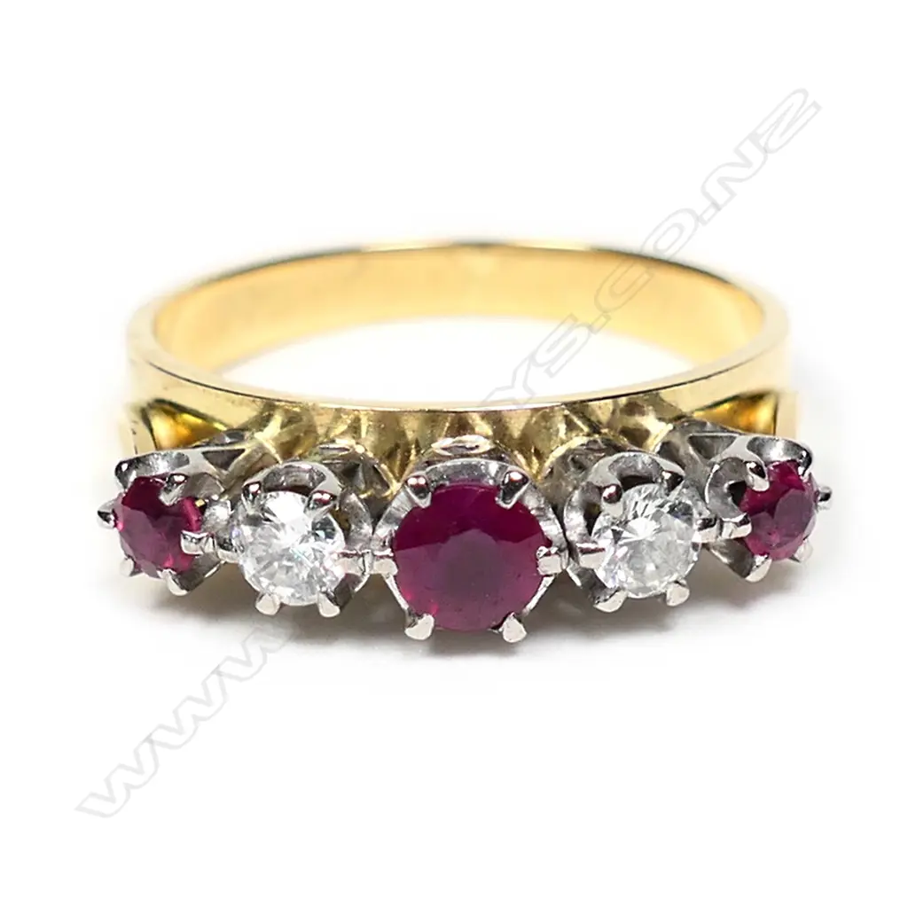 An estate 18ct ruby and diamond ring, Image 1++