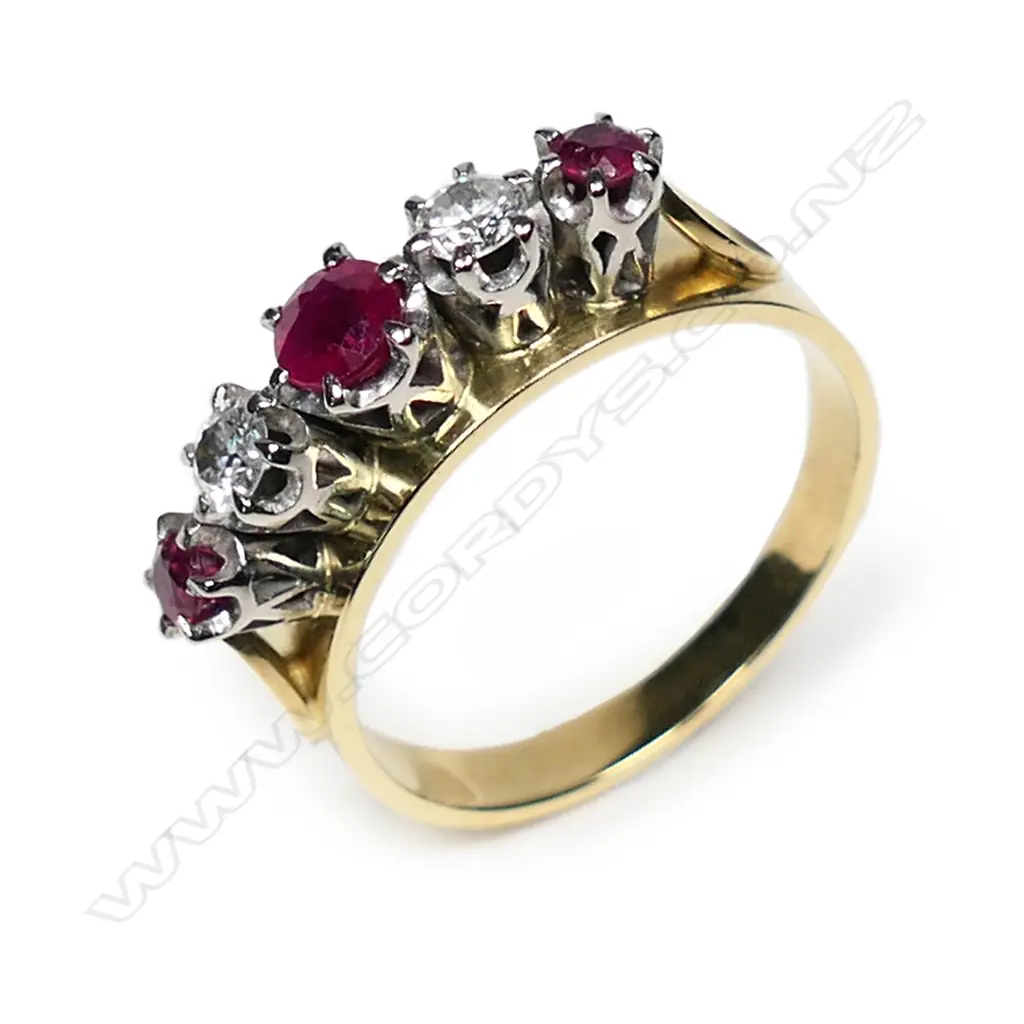 An estate 18ct ruby and diamond ring, Image 1++