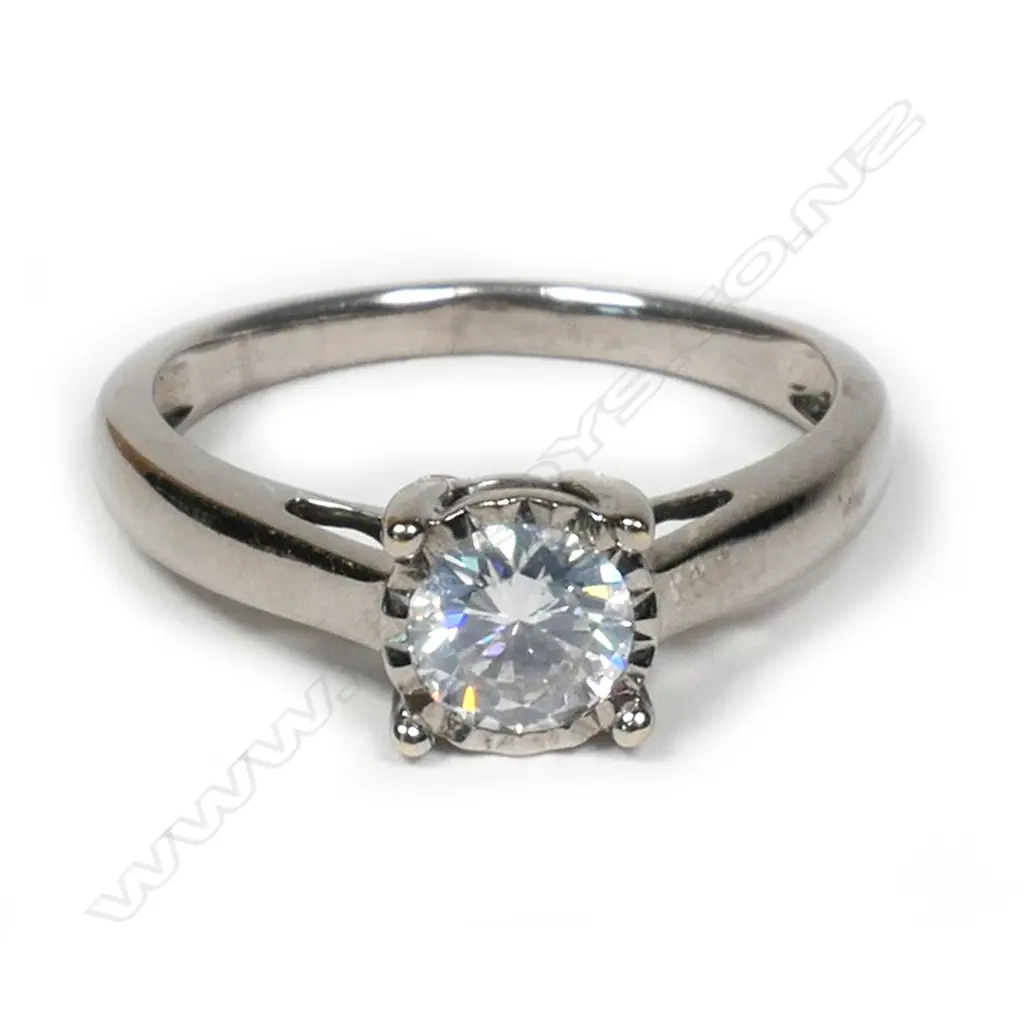 An 18ct white gold and diamond solitaire ring, Image 1++
