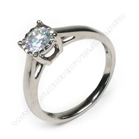 An 18ct white gold and diamond solitaire ring,