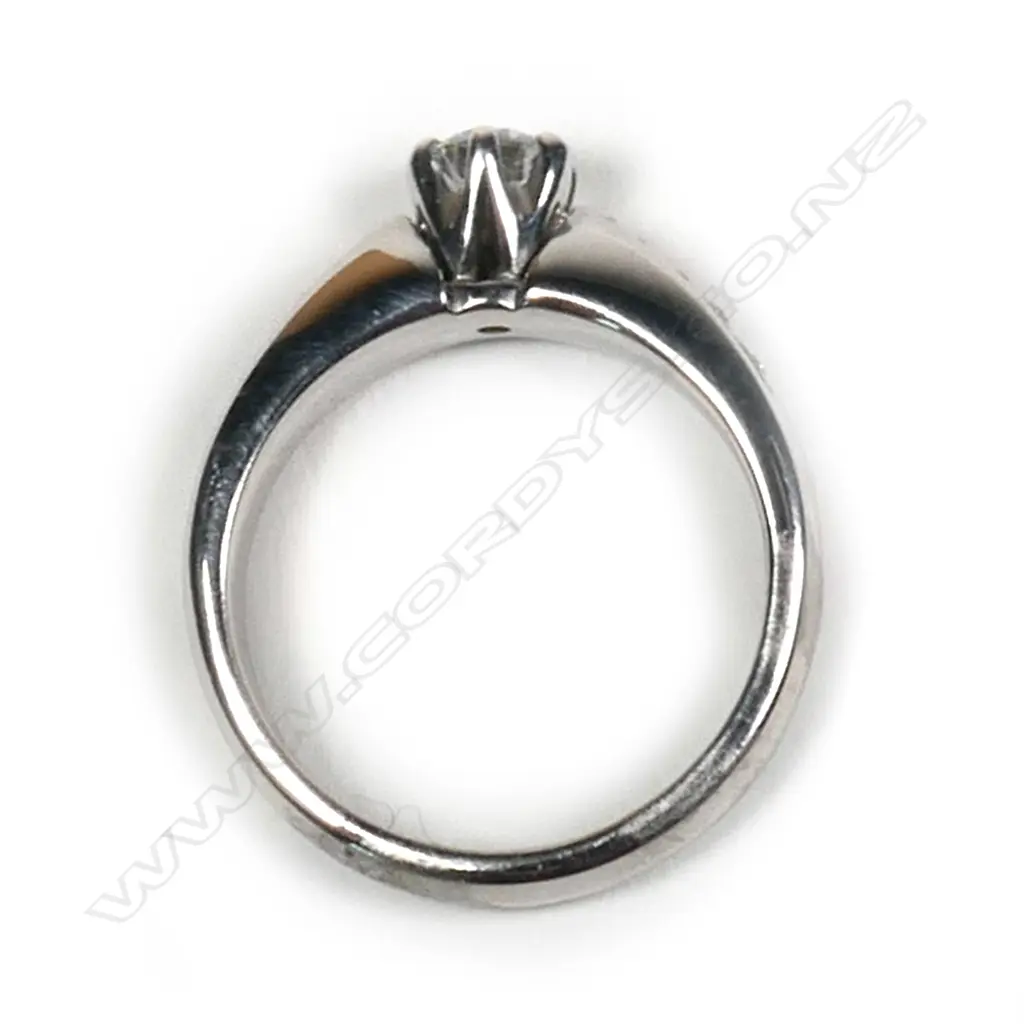 A 9ct white gold and diamond solitaire ring, Image 1++