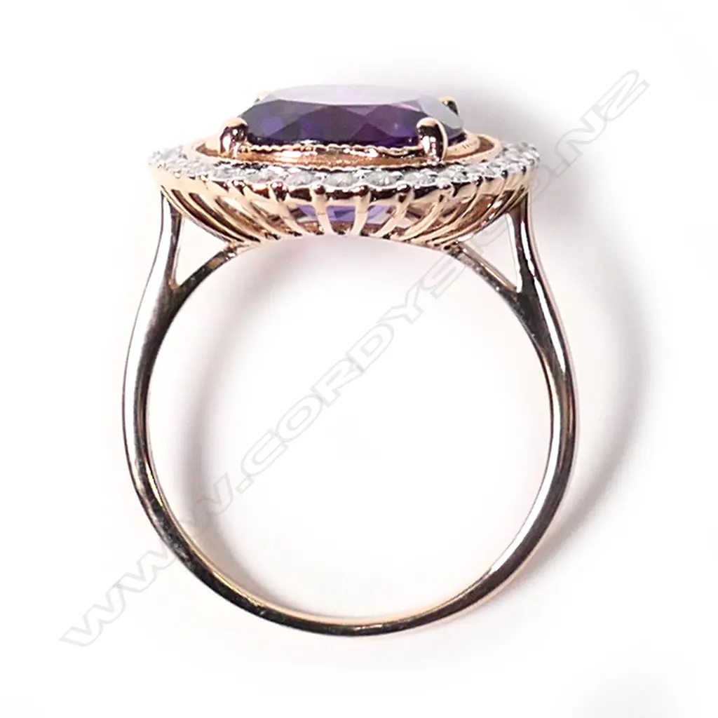 A 14ct rose gold, amethyst and diamond halo cocktail ring, Image 1++